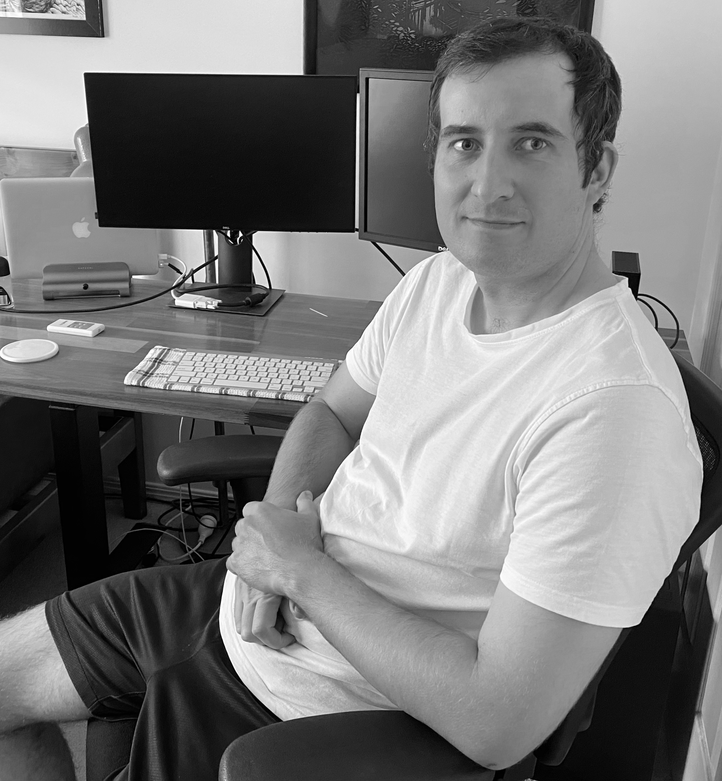 Photo of Benn Curby at desk